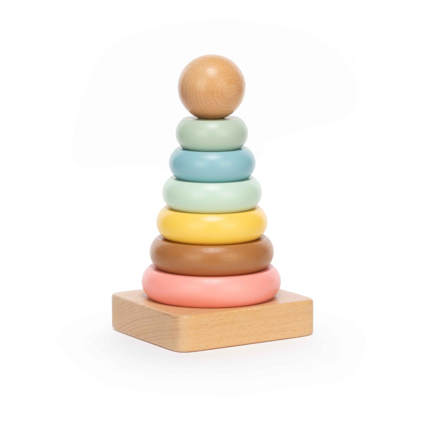 Pastel wooden stacking ring toy with seven soft-coloured rings on a natural wood base, photographed on a clean white background