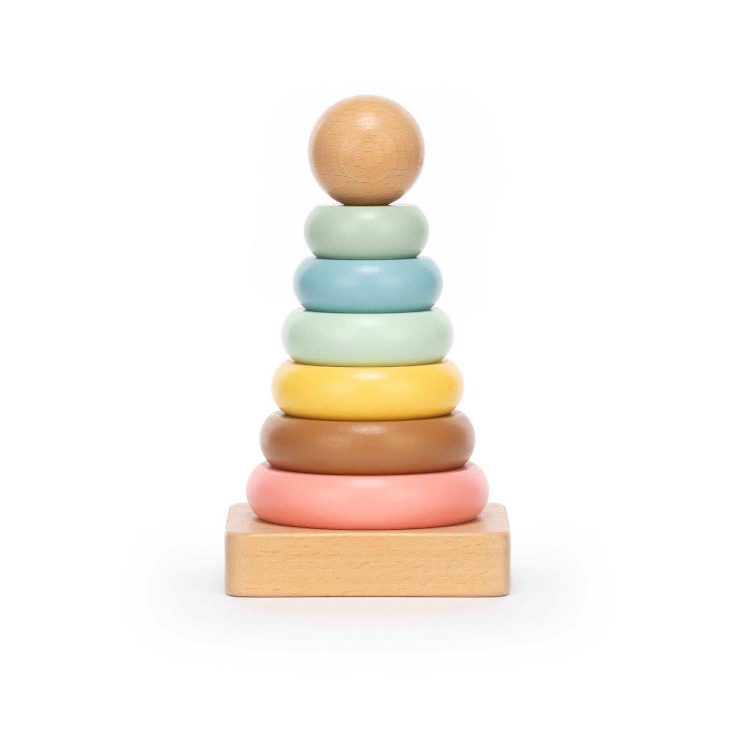 Pastel wooden stacking ring toy with seven soft-coloured rings on a natural wood base, photographed on a clean white background